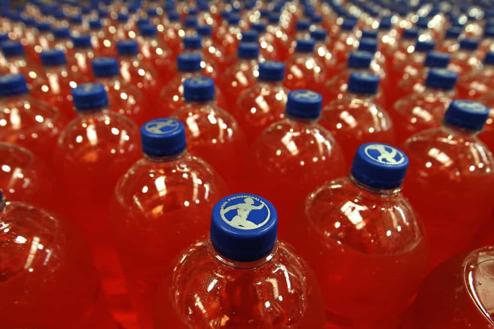 Bottles of Irn Bru in the production hall at AG Barr’s factory in Cumbernauld (Andrew Milligan/PA)