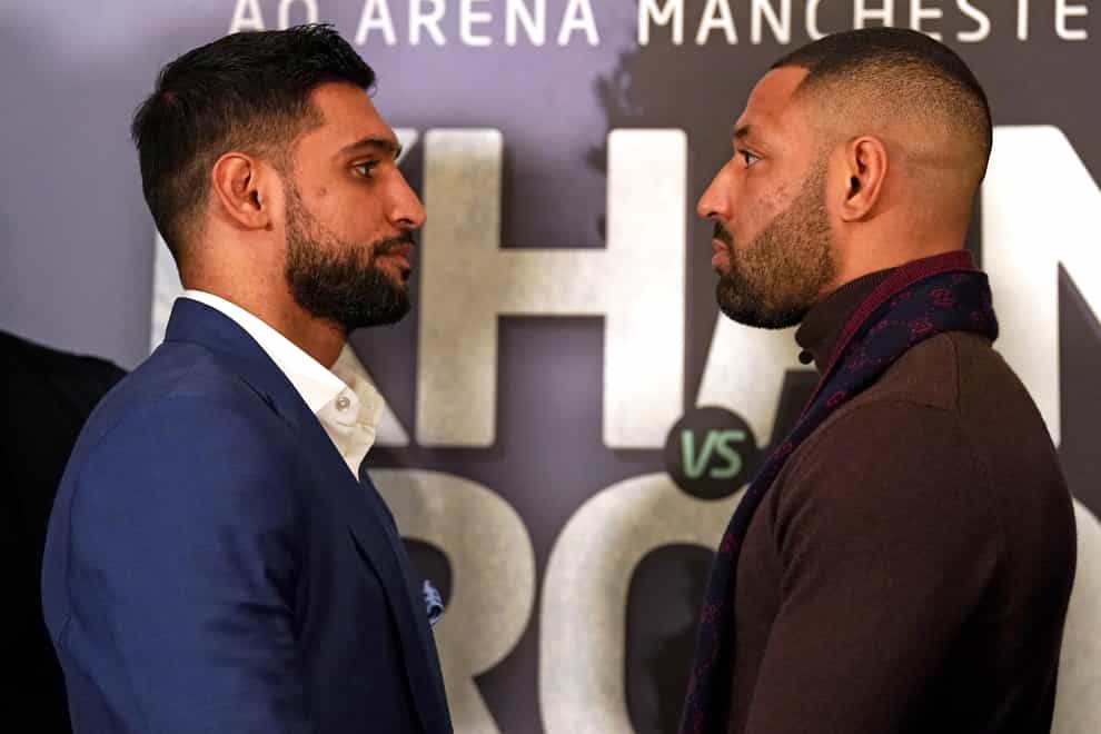 Amir Khan, left, will face bitter rival Kell Brook, right, in Manchester in February (Steve Parsons/PA)