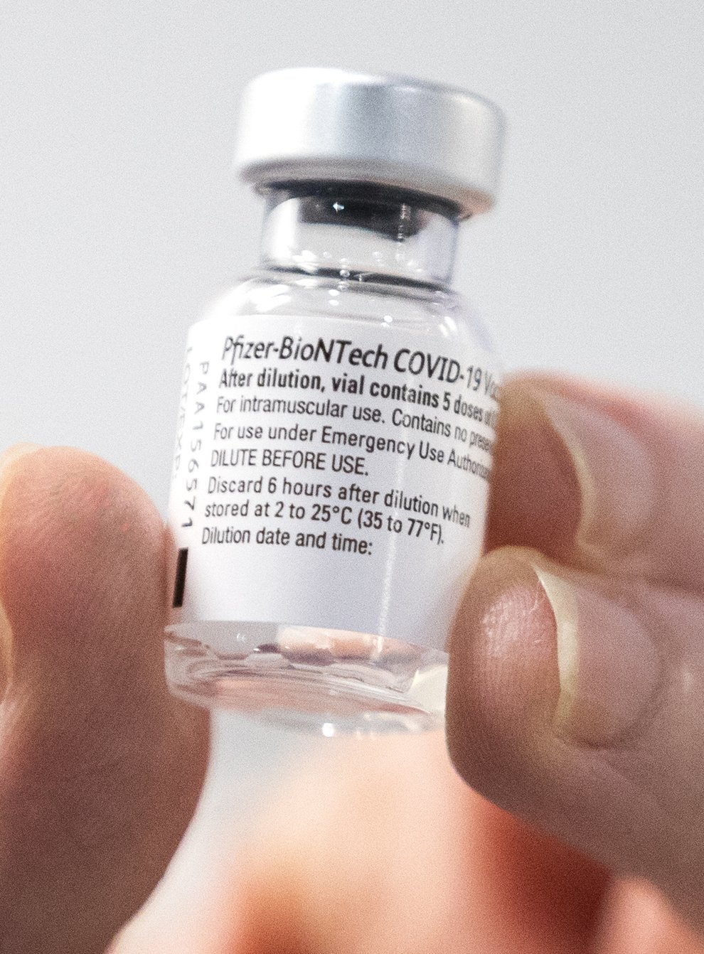 File photo dated 23/01/21 of a phial of Pfizer/BioNTech Covid-19 vaccine. UK scientists have approved an extension of the Covid vaccine booster programme in the face of the Omicron variant.