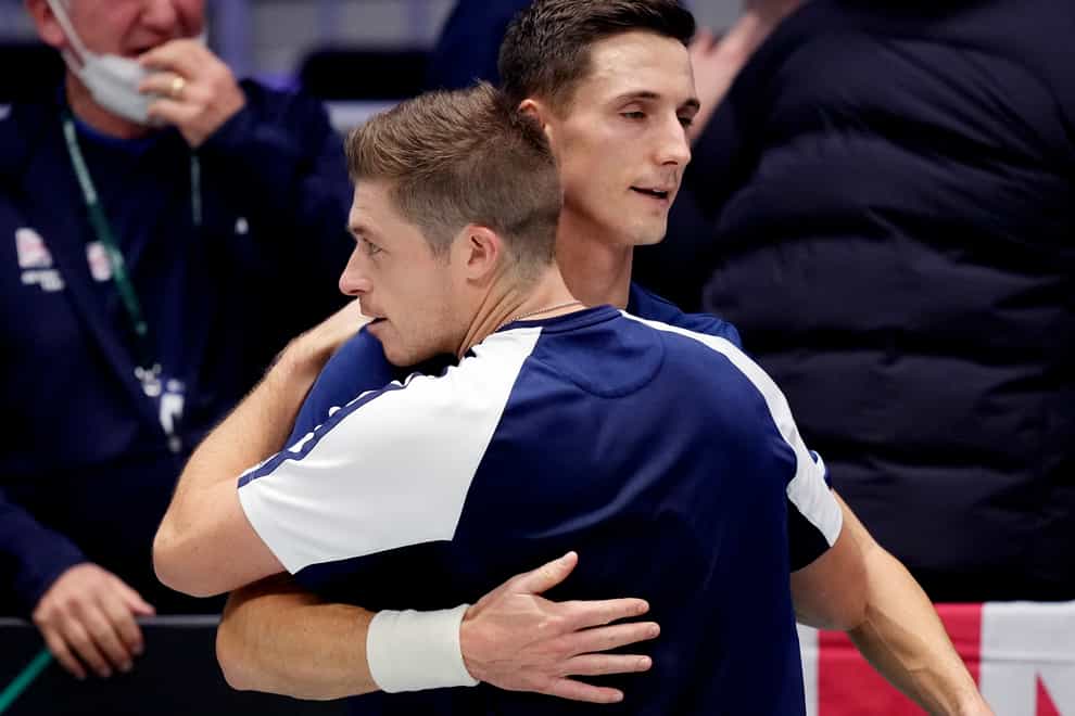 Joe Salisbury, right, and Neal Skupski celebrate after booking Britain’s spot in the quarter-finals (Michael Probst/AP)
