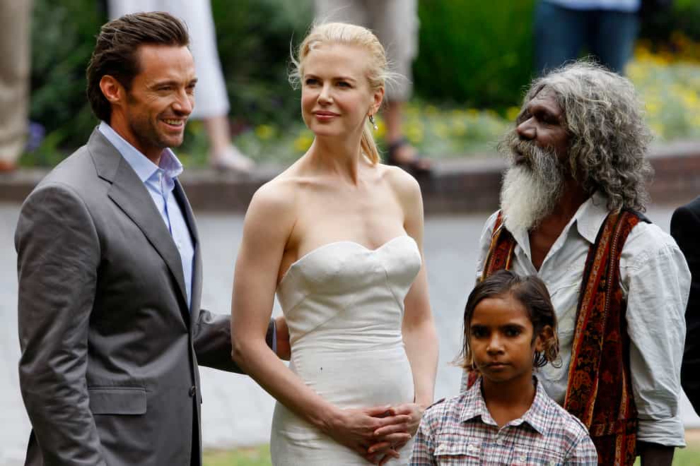 David Gulpilil, right, with Hugh Jackman, left, Nicole Kidman, centre, and Brandon Walters (Mark Baker/AP)