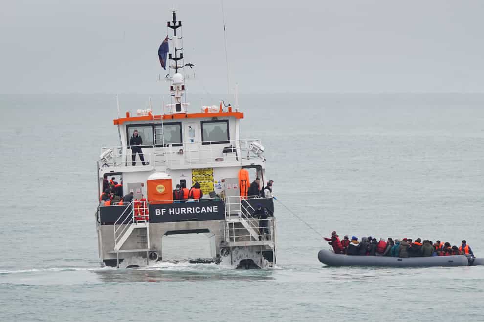 A group of people thought to be migrants are rescued off the coast of Folkestone, Kent by a Border Force vessel, as small boat incidents in the Channel continue. Picture date: Saturday November 20, 2021. (Gareth Fuller/PA)