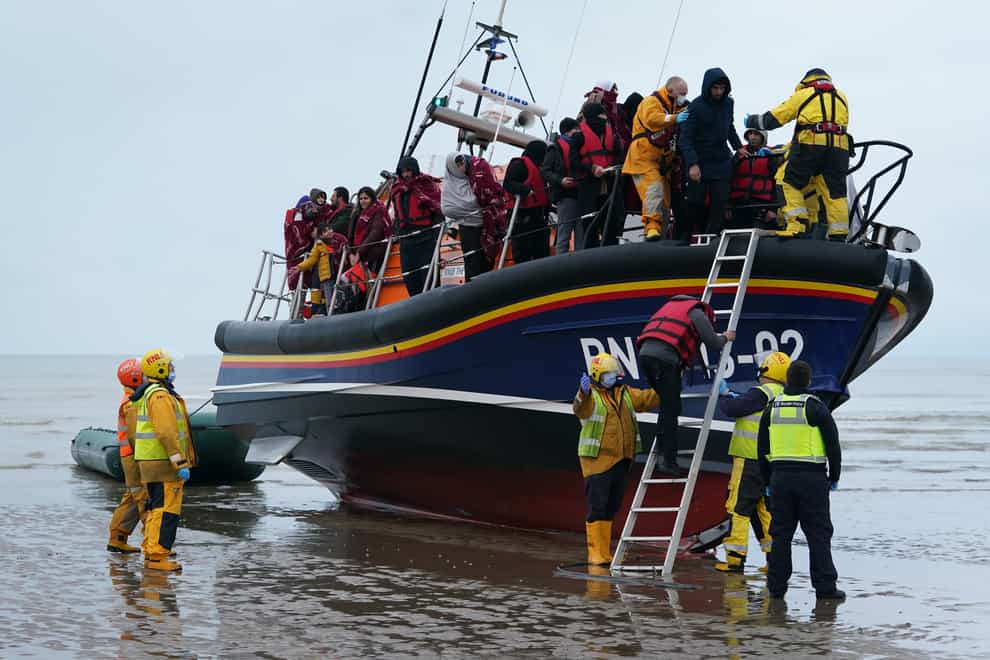 A group of people thought to be migrants are brought in to Dungeness, Kent, by the RNLI (Gareth Fuller/PA)