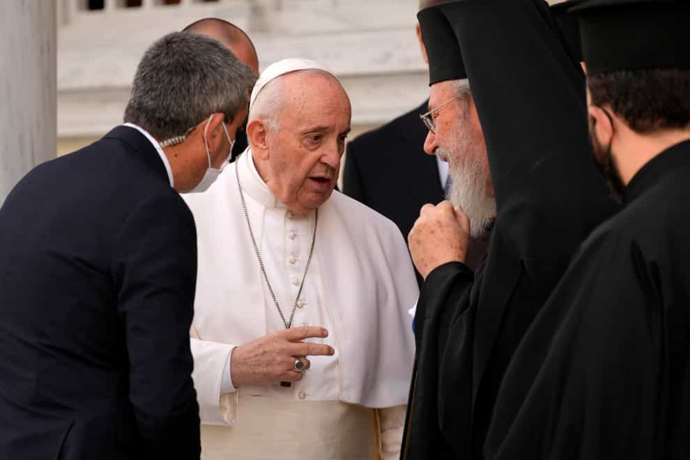 Pope Francis speaks with Archbishop Chrysostomos (AP)