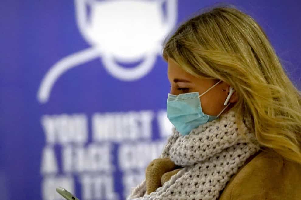 A woman wearing a face mask in London as mask wearing on public transport becomes mandatory to contain the spread of the Omicron Covid-19 variant. Picture date: Tuesday November 30, 2021.