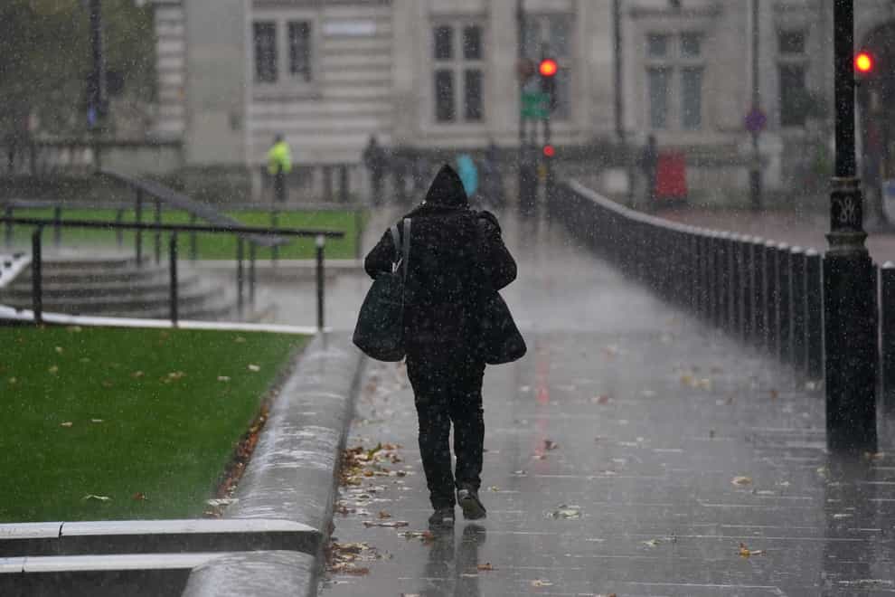 Further cold weather and rain is predicted for this weekend (Steve Parsons/PA)