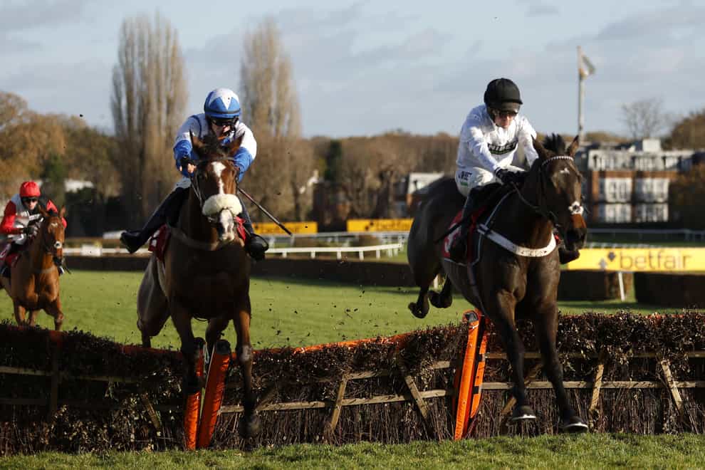Constitution Hill (right) ridden by jockey Nico de Boinville eases past Might I at Sandown (Steven Paston/PA)
