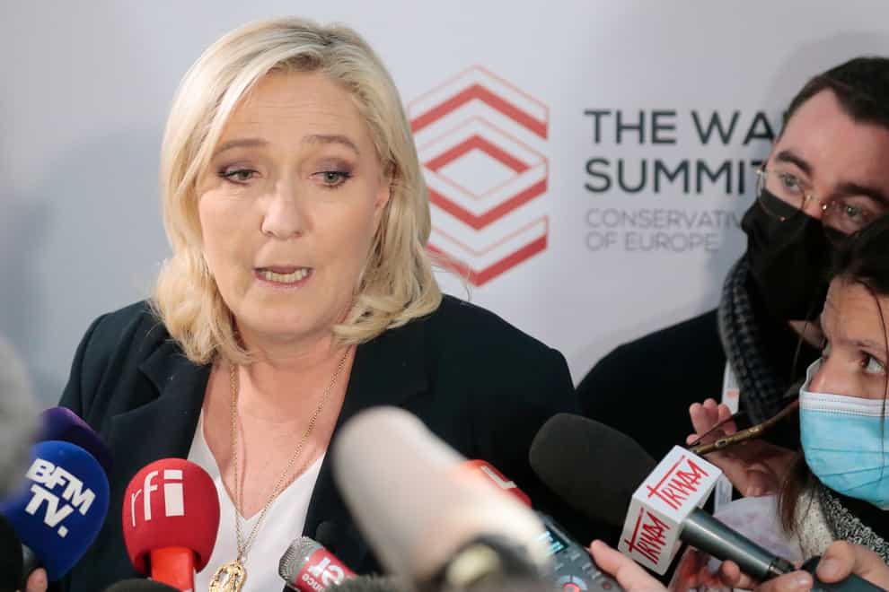 The French far-right party leader Marine Le Pen attends a press conference with reporters in Warsaw, Poland (AP)
