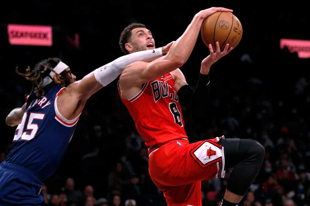 Zach LaVine (8) led Chicago Bulls to victory (Noah K. Murray/AP)