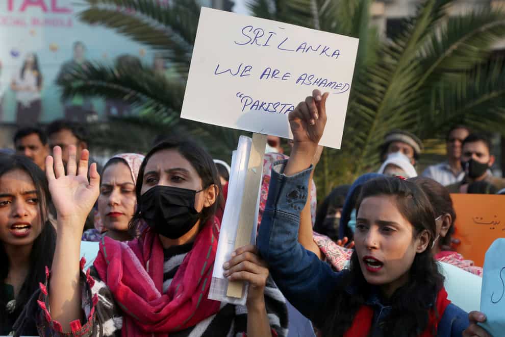Members of a civil society group participate in a demonstration to condemn Sialkot’s lynching incident, in Lahore, Pakistan (KM Chaudary/AP)