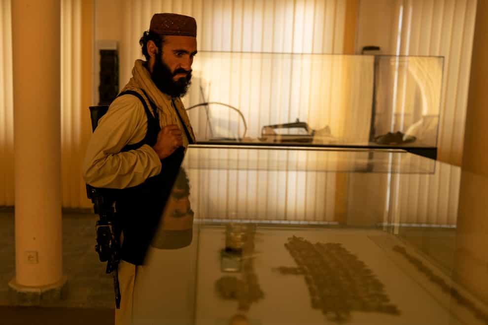 Taliban fighter Mansoor Zulfiqar visits the National Museum of Afghanistan (Petros Giannakouris/AP)