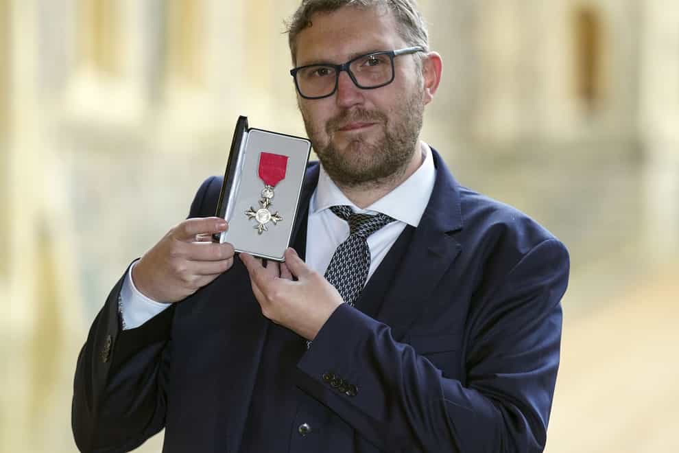 Jay Flynn is made an MBE (Member of the Order of the British Empire) by the Duke of Cambridge at Windsor Castle (Steve Parsons/PA)
