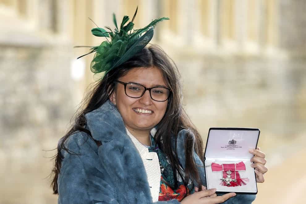 Amelia Collins-Patel from Thurnby with her award after she was made an MBE (Steve Parsons/PA)
