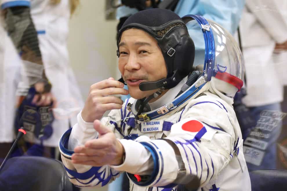 Retail tycoon Yusaku Maezawa of Japan will spend 12 days in space (Roscosmos Space Agency via AP)