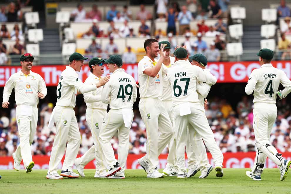 Australia’s Josh Hazlewood celebrates the wicket of England’s Joe Root during day one (Jason O’Brien/PA)