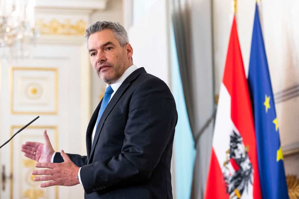 Austrian Chancellor Karl Nehammer speaks at a news conference about his plans for the upcoming weeks (Lisa Leutner/AP)