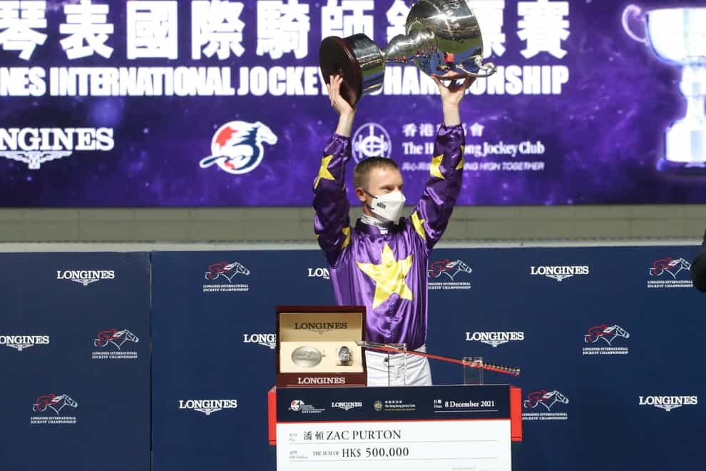 Zac Purton lifts the trophy for victory in the Longines International Jockeys’ Challenge at Sha Tin (Hong Kong Jockey Club)