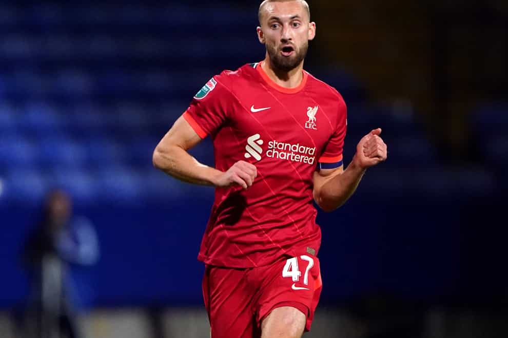 Liverpool defender Nat Phillips wants more first-team football (Tim Goode/PA)