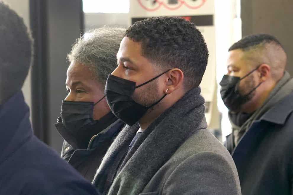 Actor Jussie Smollett arrives with his mother Janet at the Leighton Criminal Courthouse (Charles Rex Arbogast/AP)