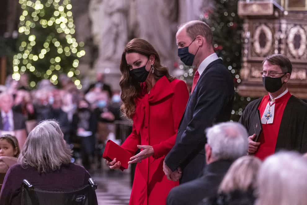 The Duke and Duchess of Cambridge talk to the congregation ahead of the carol service (Heathcliff O’Malley/PA)