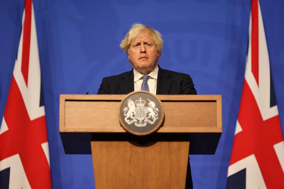 Prime Minister Boris Johnson during a press conference at Downing Street after ministers met to consider imposing new restrictions (Adrian Dennis/PA)