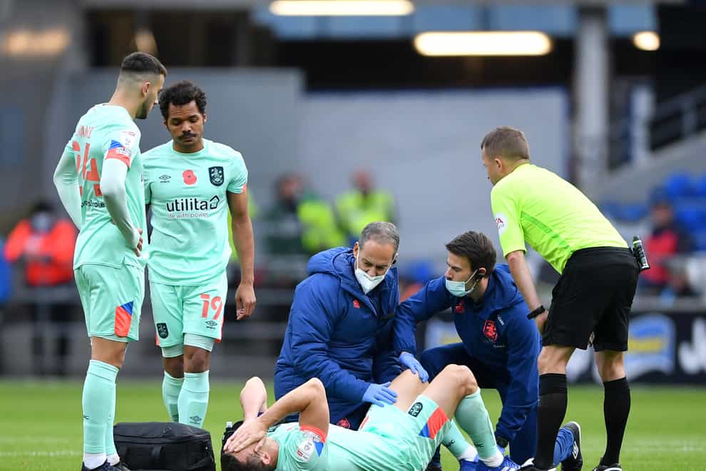 Huddersfield’s Jonathan Hogg receives treatment for an injury (Simon Galloway/PA)