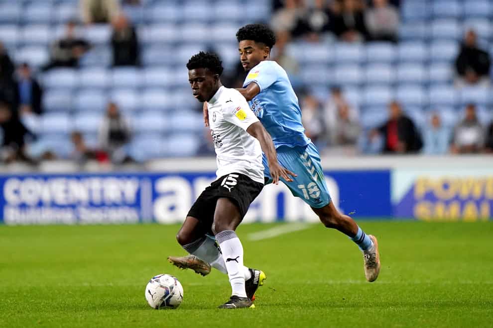 Peterborough midfielder Kwame Poku (left) is set to play in a cast (Tim Goode/PA)