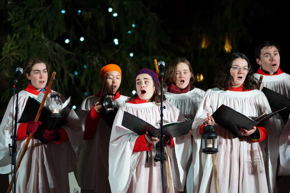Removing a face covering to sing should happen only in ‘reasonably necessary’ situations such as in a choir, according to newly published regulations (Kirsty O’Connor/PA)