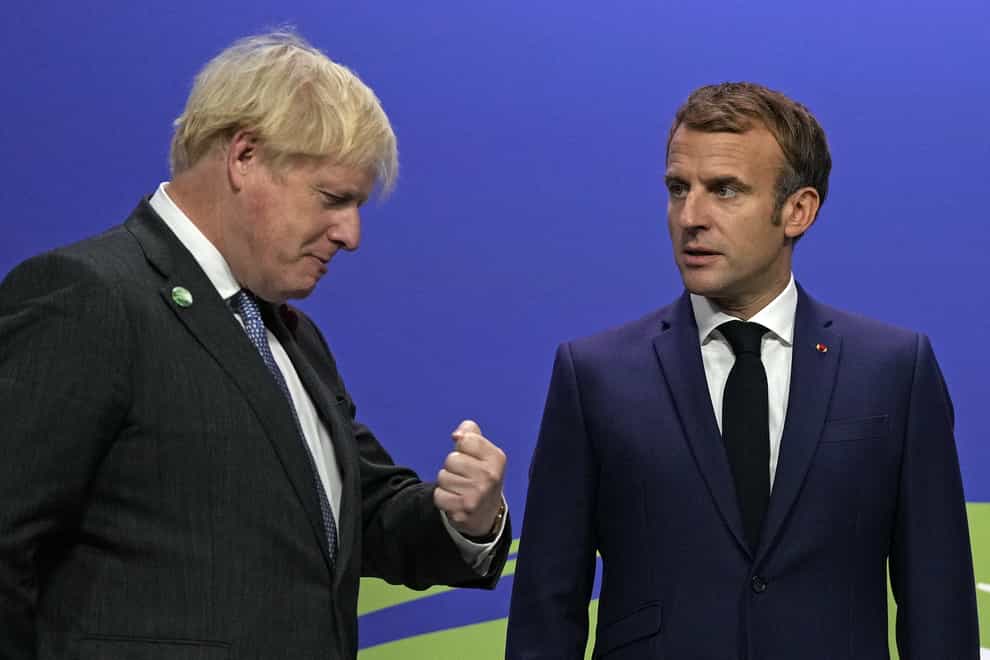 Prime Minister Boris Johnson alongside French President Emmanuel Macron (PA)