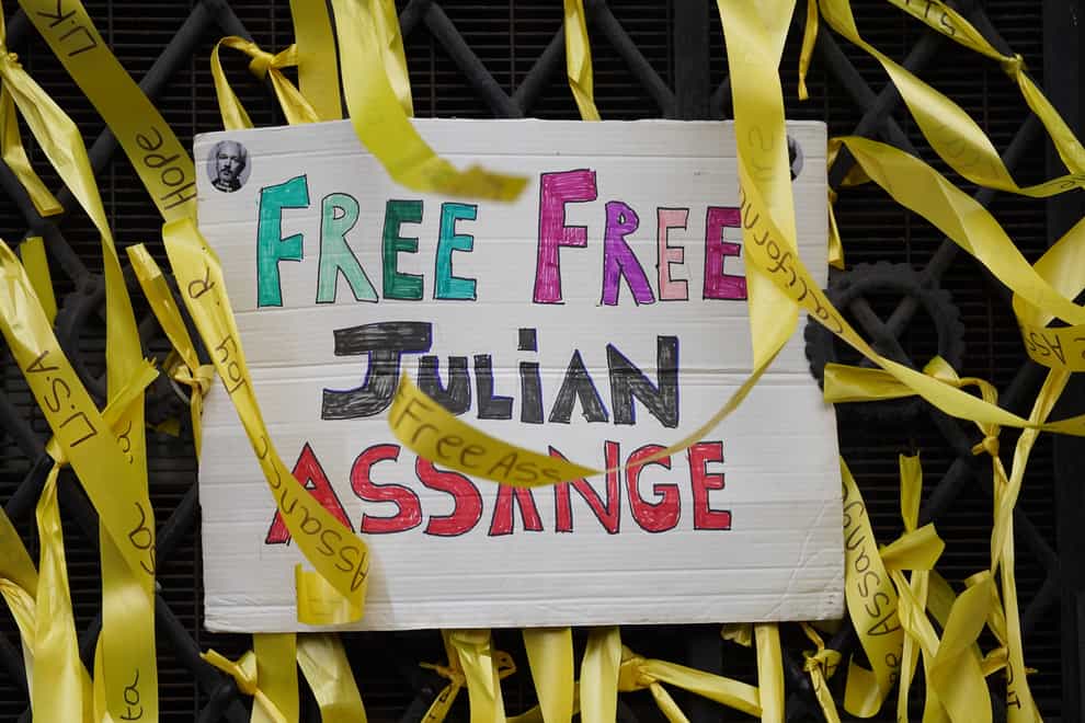 Julian Assange supporters gathered outside the High Court in London on Friday as the ruling was handed down (Kirsty O’Connor/PA)