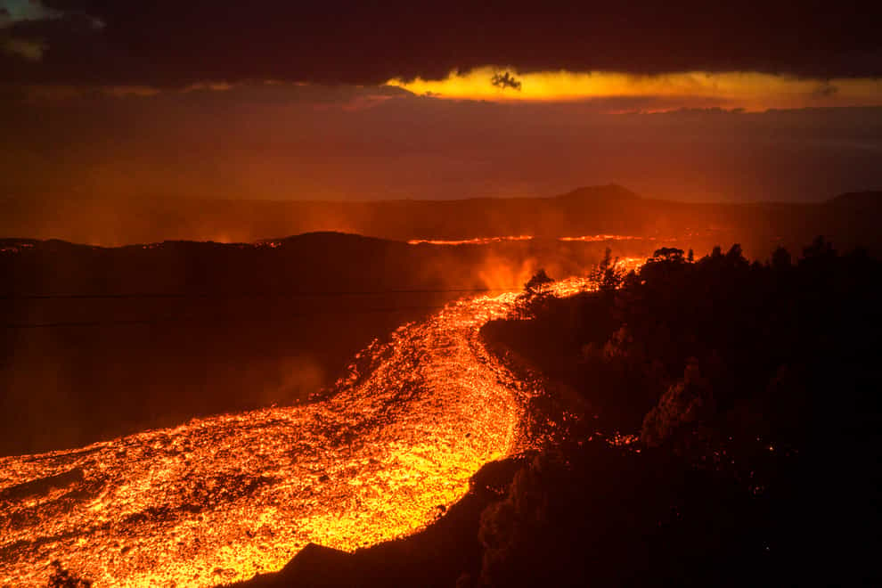 Lava flows from the Cumbre Vieja volcano on the island of La Palma (Emilio Morenatti/AP)