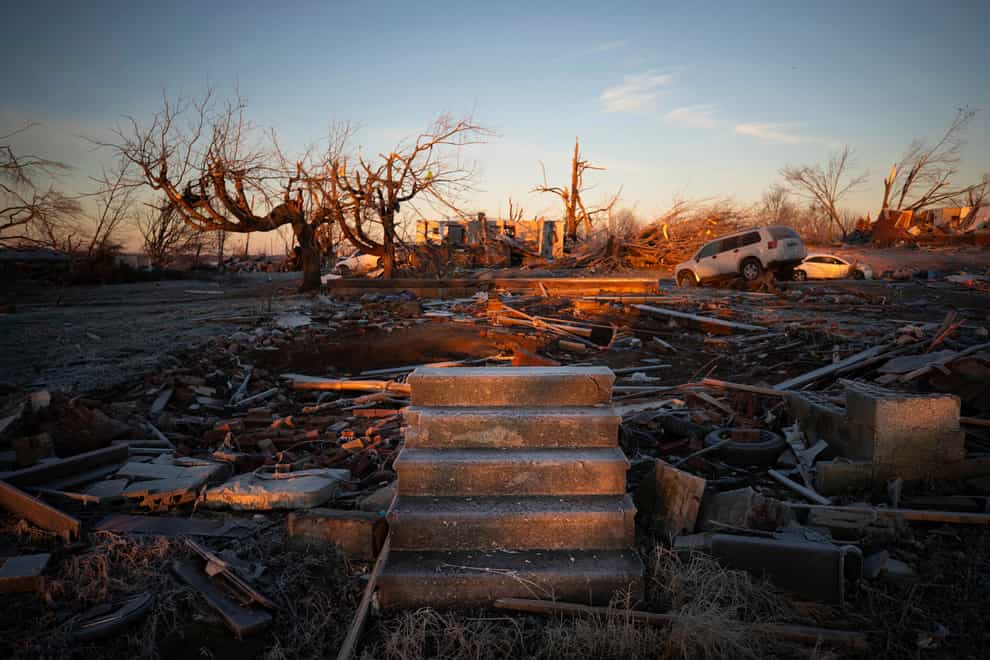 The front steps of a house are all that remain after a tornado in Dawson Springs, Kentucky (Michael Clubb/AP)