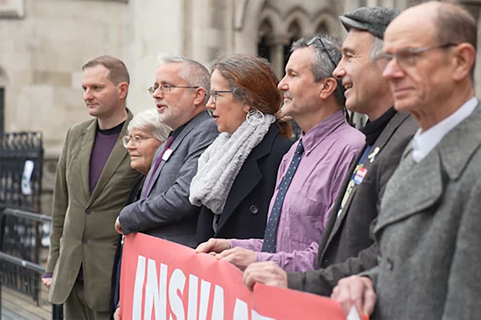 Members of Insulate Britain outside the High Court in London (Elspeth Keep/PA)