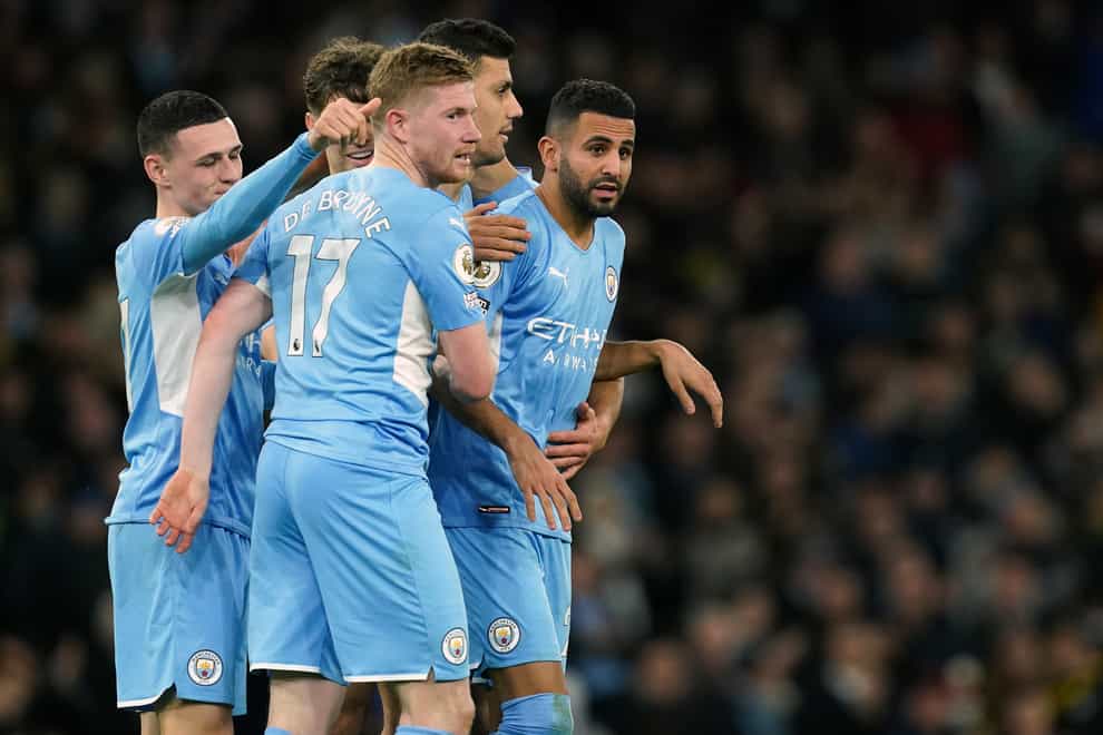 Kevin De Bruyne, centre, scored twice in a thumping win for Manchester City (Martin Rickett/PA)