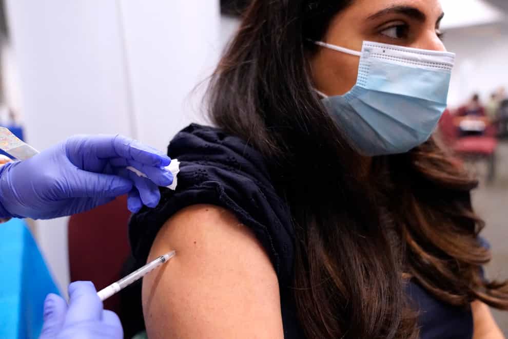 The US death toll from Covid-19 topped 800,000 on Tuesday, a figure seen as doubly tragic given more than 200,000 of those lives were lost after the vaccine became widely available last year (Nam Y Huh/AP)