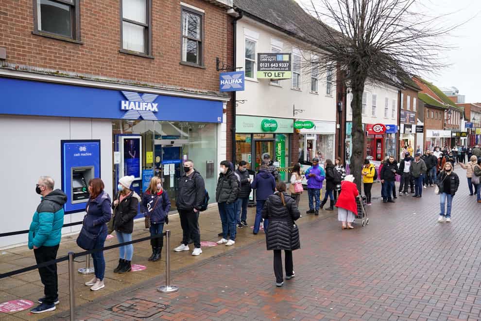 Hundreds of people queue at a vaccination centre on Solihull High Street, West Midlands (Jacob King/PA)