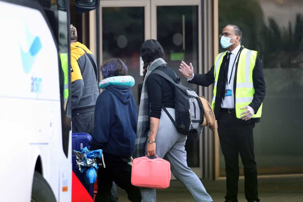 Travellers detained in quarantine hotels will be told later today when they will be released, a senior official said (Yui Mok/PA)