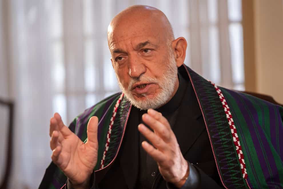 Hamid Karzai said the Taliban had been invited into Kabul deliberately (AP Photo/Petros Giannakouris)