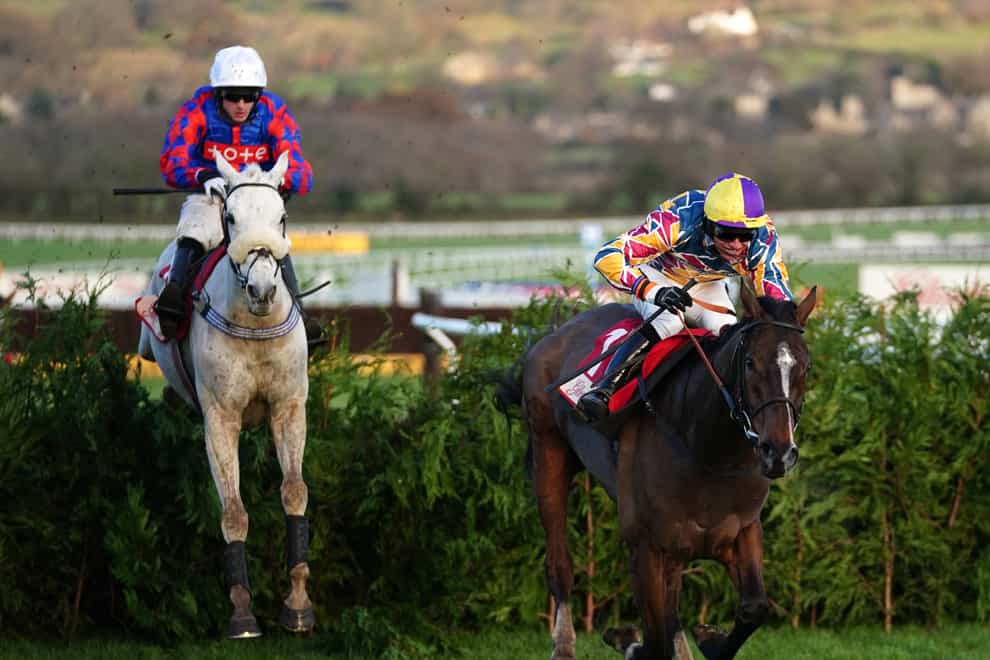 Diesel D’Allier (left) and Potters Corner jump the final obstacle at Cheltenham (David Davies/PA)
