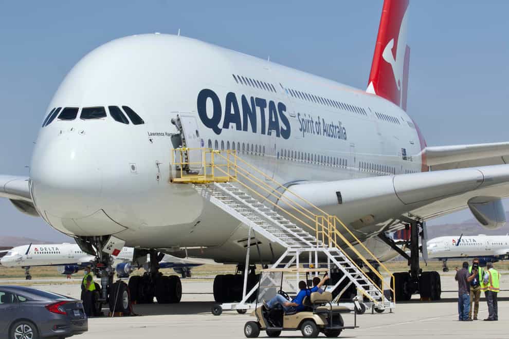 Qantas said the emergence of the Omicron variant of COVID-19 is affecting international bookings after Australia finally began to ease entry restrictions (AP Photo/Matt Hartman, File)
