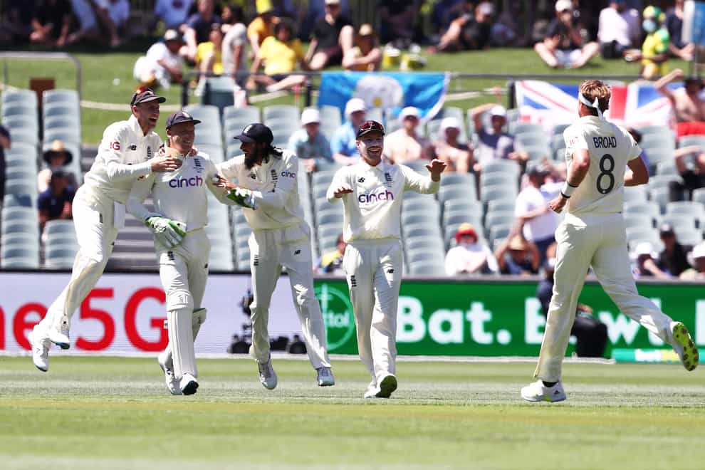 England players celebrate after Jos Buttler caught out Marcus Harris (Jason O’Brien/PA)