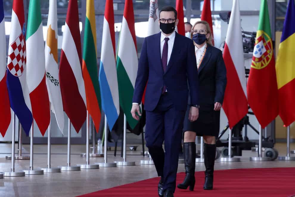 Poland’s Prime Minister, Mateusz Morawiecki, arrives for an EU summit in Brussels to discuss Russia’s military threat to Ukraine and the continuing Covid-19 crisis (Kenzo Tribouillard/Pool Photo via AP)