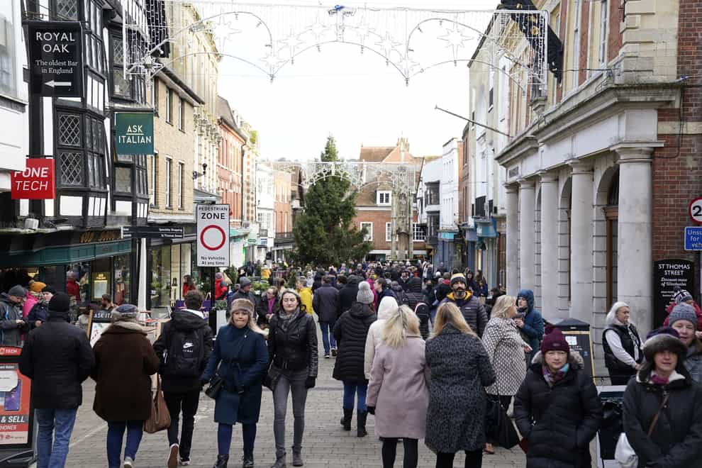 Christmas shoppers in Winchester, Hampshire (Andrew Matthews/PA)