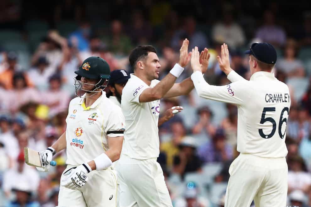 England’s James Anderson celebrates the wicket of Australia’s Steve Smith (Jason O’Brien/PA)