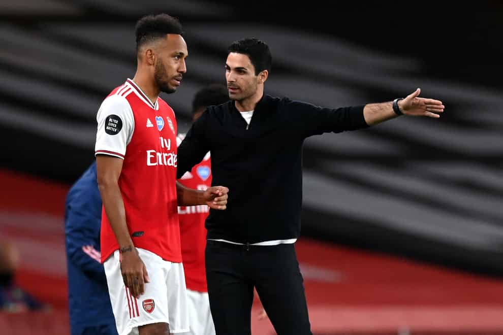 Arsenal manager Mikel Arteta (right) admits it was a difficult experience to take such a strict stance with former captain Pierre-Emerick Aubameyang (Shaun Botterill/NMC Pool/PA)