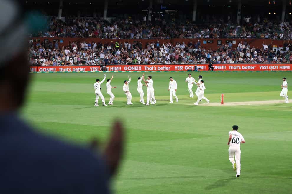 Australia’s Mitchell Starc celebrates the wicket of England’s Rory Burns (Jason O’Brien/PA)