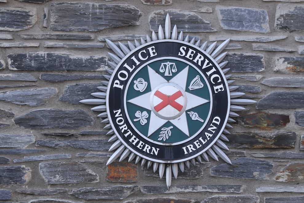 A stock picture of a Police Service of Northern Ireland (PSNI) logo badge (Niall Carson/PA)