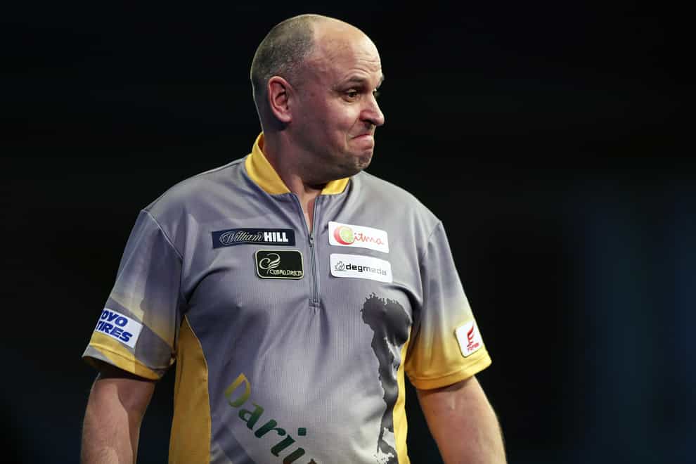Darius Labanauskas hit a nine-darter but was eliminated from the William Hill World Championship (Kieran Cleeves/PA)