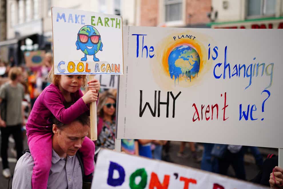 Parents and children take part in a global youth climate strike in Bristol, one of more than 1,000 events taking place around the world just over a month before the UN Cop26 climate talks in Glasgow. Picture date: Friday September 24, 2021.