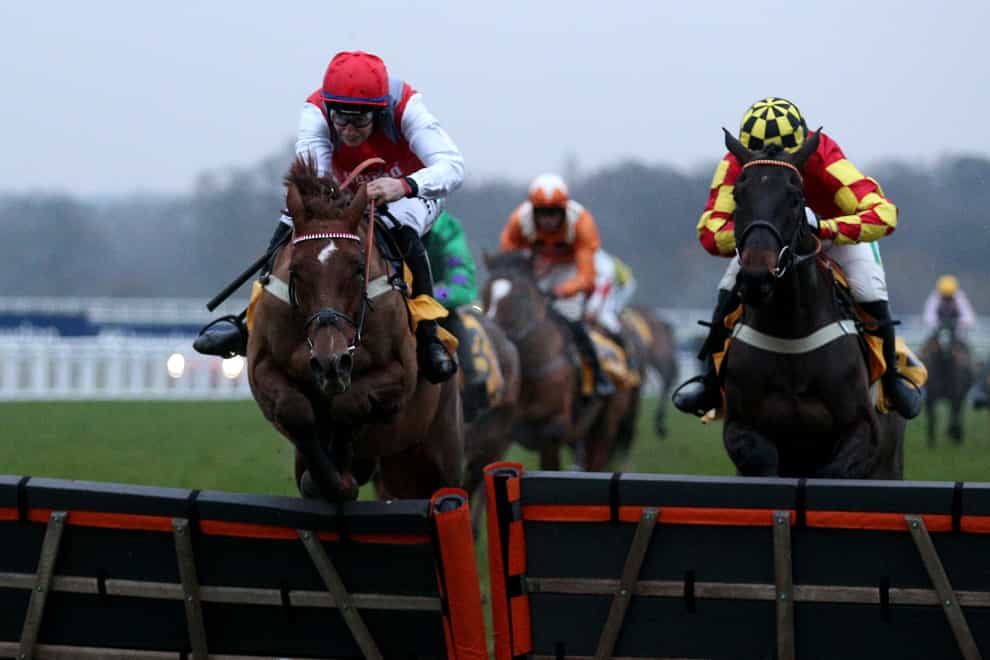 Tritonic jumps the last at Ascot (Nigel French/PA)